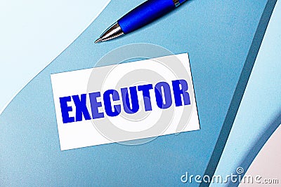 White blank card with EXECUTOR text and blue pen on blue, cyan and pink background Stock Photo