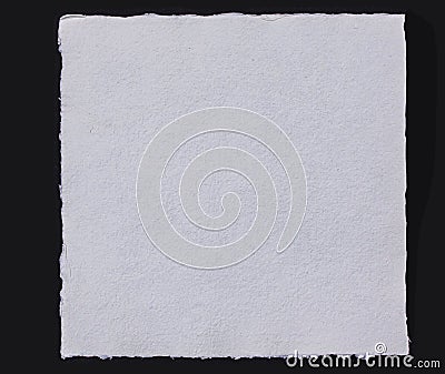 White blank handmade rough watercolor or aquarell paper sheet with torn edges. Close up isolated on black background. Stock Photo