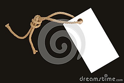 White, blank paper price tag or label on a beautiful twisted cord, isolated on a black background Stock Photo