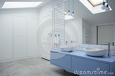 White and blue bathroom interior Stock Photo