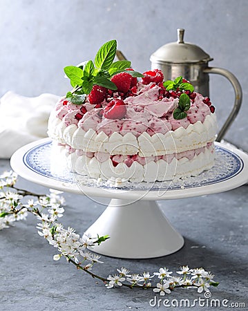 Meringue layer cake with fresh raspberry cream Stock Photo