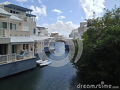 White and blue Caribbean houses over water Editorial Stock Photo