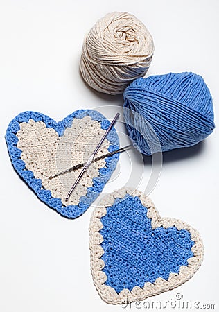 White and Blue Crochet Knitted Hearts Stock Photo