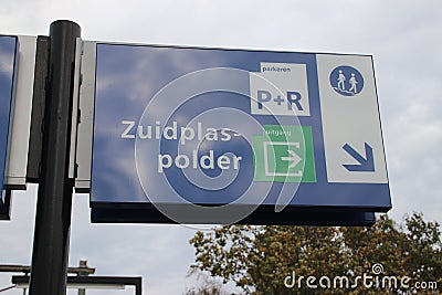 White and blue direction sign to Zuidplaspolder on the platform of train station Nieuwerkerk aan den IJssel Editorial Stock Photo