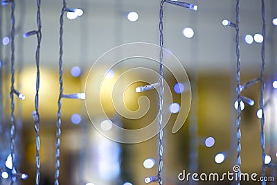 White and blue electric colored garland, background Stock Photo