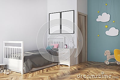 Blue nursery interior, armchair and posters side Stock Photo