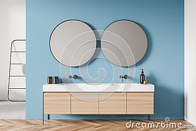 White and blue shower room with round mirrors Stock Photo
