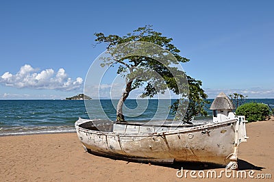 White boat on the beach Stock Photo