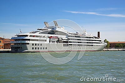 White boat on a mooring in the port of Venice Editorial Stock Photo