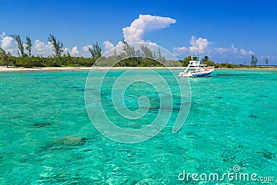 White boat on the turquise Caribbean Sea Stock Photo