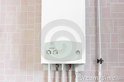 White boiler in the house Stock Photo
