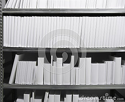 White books in a shelf Stock Photo