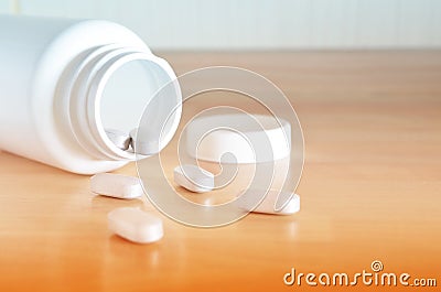 White bottle of pills Stock Photo