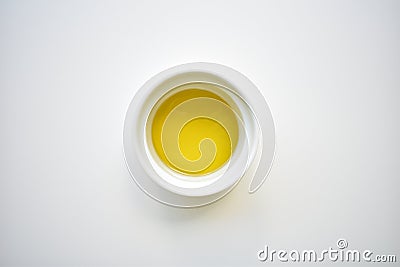 White bowl extra virgin olive oil close up Stock Photo