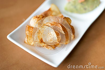 White bowl Potato chips. Stock Photo