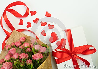 White box, red hearts and red ribbon. Bouguet pink rose Stock Photo