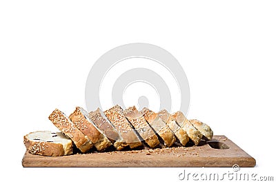 White bread with sesame sliced on a board Stock Photo