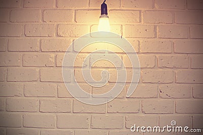 White brick room with bulb - vintage Stock Photo