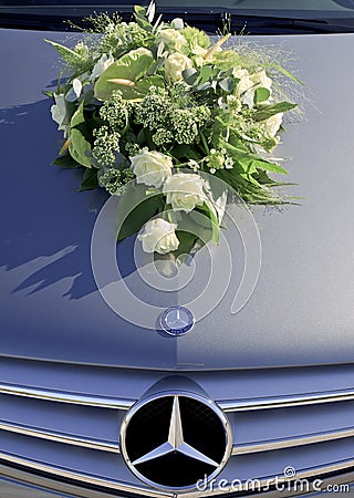 White bridal bouquet upon Mercedes car Editorial Stock Photo