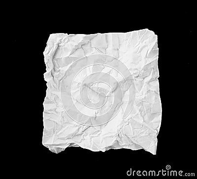 White broken and creased paper note isolated on a black background. Stock Photo