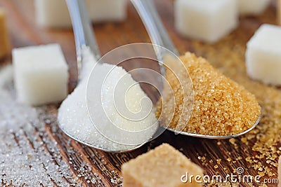 White and brown sugar in spoon Stock Photo