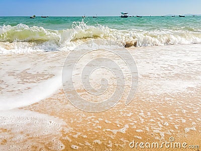 White bubbles created on the beach by ocean waves on seashore Foam bubbles abstract white background. Detergent white foam with s Stock Photo