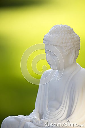 White Buddha on green 02 Stock Photo