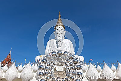 White Buddha statue at Wat Pha Sorn Kaew. Wat Pha Sorn Kaew or W Stock Photo