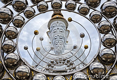 White Buddha Statue at Wat Prathat Phasornkaew Thailand Stock Photo