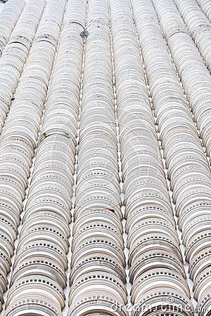 White building lined with balconies Stock Photo