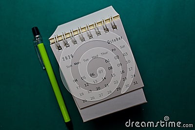 White Calendar October 2020 on office desk background Stock Photo