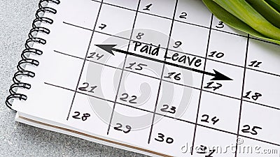 Paid leave marked on a calendar Stock Photo