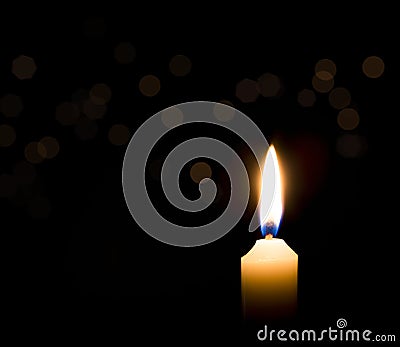 White candle on black background Stock Photo