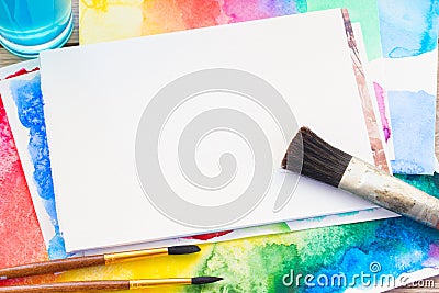White canva with frame of paints and brushes Stock Photo