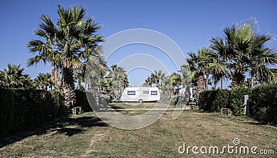 White caravan in a camping Stock Photo
