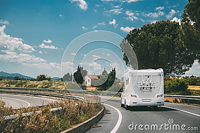 White Caravan Motorhome Car Goes On Highway Road Stock Photo