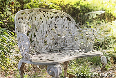 White cast iron bench in the garden of Asukayama park in the Kit Stock Photo