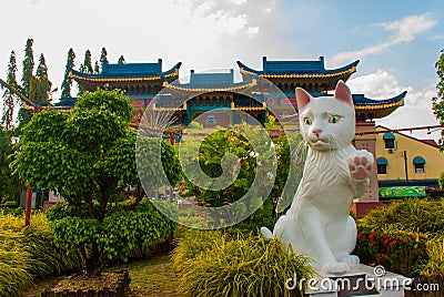 White cat monument is the Kuching South City Council Cat Statue. Sarawak Malaysia. Editorial Stock Photo