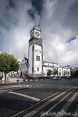 White cathedral clock tower - Azores Portugal Sao Miguel Ponta D Stock Photo