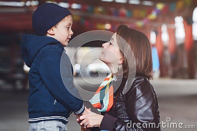 white Caucasian mother and son talking to each other, happy family of two Stock Photo