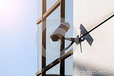 White CCTV cameras on the street, security in the city. covert shooting of what is happening. modern technologies and equipment Stock Photo