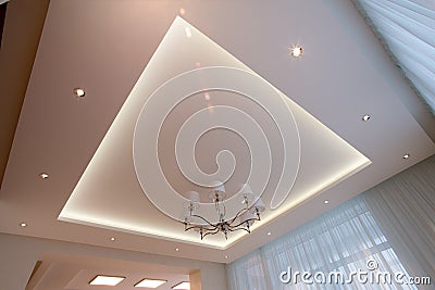 White ceiling illuminated with LED Stock Photo