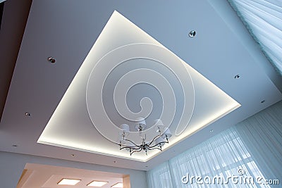 White ceiling illuminated with LED Stock Photo