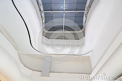 White ceiling with neon lights In the building. White ceiling can reflect light well. The right light at work Stock Photo