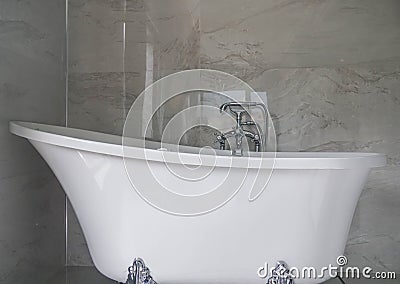 White ceramic bath tub in luxury hotel bedroom Stock Photo