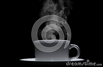 white ceramic coffee cup with floating smoke. Stock Photo