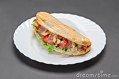 White ceramic plate with big tasty grill sandwich Stock Photo