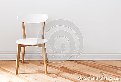 White chair in an empty room Stock Photo