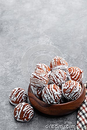 White chocolate glazed cookies on gray background Stock Photo