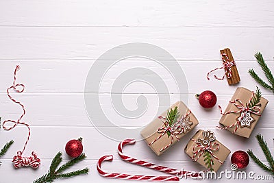 White christmas background. Framewith christmas gifts and candy cane, decorations , pine cones, fir branches Stock Photo